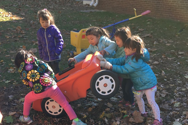 children at play push cart